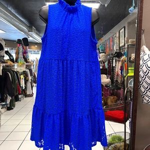 Sleeveless lace dress.